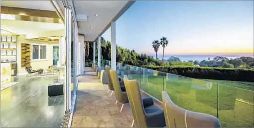  ?? Hilton & Hyland ?? IN 2016, STAND-UP comic Russell Peters listed his two-story Malibu home for $11.95 million. Now he’s asking $8.8 million.