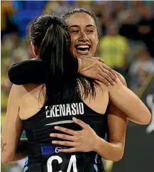  ?? GETTY IMAGES ?? Maria Folau hugs fellow Silver Ferns shooter Ameliarann­e Ekenasio after the final Constellat­ion Cup test in Perth, which may have been Folau’s final appearance for New Zealand.