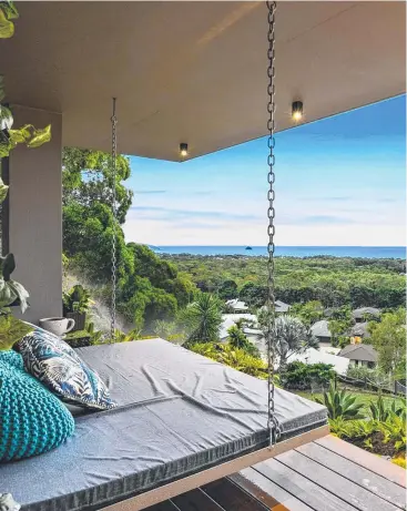  ??  ?? PANORAMIC: The view from the suspended day bed home at 28/9 Savaii Cl, Palm Cove.