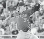  ??  ?? Florida pitcher Brady Singer had two wins in last year’s CWS. BRUCE THORSON/USA TODAY SPORTS