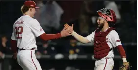  ??  ?? Jaxon Wiggins (left) will be the starting pitcher tonight for the Arkansas Razorbacks when they host Arkansas State at Baum-Walker Stadium in Fayettevil­le.
(Arkansas Democrat-Gazette/Andy Shupe)