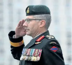  ?? SEAN KILPATRICK/THE CANADIAN PRESS ?? Lt. Gen. Paul Wynnyk salutes after assuming command of the Canadian Army from Lt. Gen. Marquis Hainse during a ceremony on Parliament Hill in Ottawa on July 14, 2016. Wynnyk is hoping the days of having to pinch pennies just to train his soldiers are...