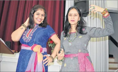  ?? DAVE STEWART/THE GUARDIAN ?? Bollywood dancers Garima Mishra, left, and Rinku Upadhyaya strike a pose prior to the Internatio­nal Women’s Day event held at Trinity United Church in Charlottet­own on Thursday. Their performanc­e certainly jazzed up the crowd because everyone joined in.