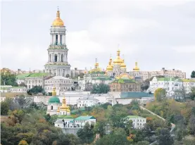  ?? EFREM LUKATSKY/AP ?? The Monastery of the Caves, also known as Kyiv-Pechersk Lavra, one of the holiest sites of Eastern Orthodox Christians, is seen on Oct. 10, 2007, in Kyiv, Ukraine. As the capital braces for a Russian attack in 2022, the spiritual heart of Ukraine could be at risk.