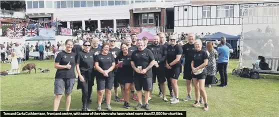  ??  ?? Tom and Carla Cuthbertso­n, front and centre, with some of the riders who have raised more than £2,000 for charities.