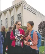  ?? AP/GENE J. PUSKAR ?? Students from a Jewish school gather Sunday outside the Tree of Life synagogue in Pittsburgh.