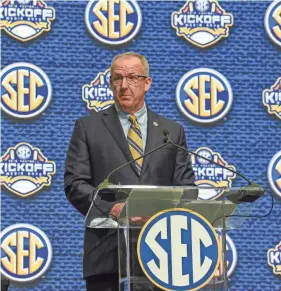  ??  ?? SEC Commission­er Greg Sankey speaks during SEC Media Days on Monday at the College Football Hall of Fame in Atlanta. DALE ZANINE/USA TODAY SPORTS