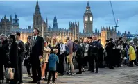  ?? AP ?? The lines of mourners passing the Queen’s coffin in Westminste­r Hall have been doubled, given the massive queues.