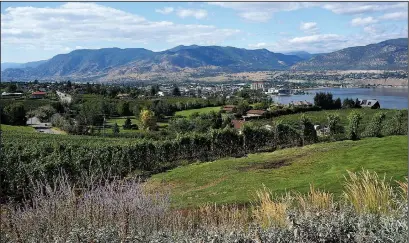  ?? The Washington Post/LEAH MCINTYRE ?? Almost every winery in the Okanagan Valley offers a lake view, such as this vista from the tasting room at Poplar Grove winery in Penticton, along the southern shores of Okanagan Lake.