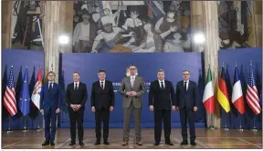  ?? (AP/Serbian Presidenti­al Press Service) ?? Serbian President Aleksandar Vucic (third right) poses with Italian diplomat Alessandro Cattaneo (left), French presidenti­al adviser Emmanuel Bonne (second left), European Union envoy Miroslav Lajcak (third left), U.S. Deputy Assistant Secretary Gabriel Escobar (second right) and the German chancellor’s adviser, Jens Plettner (right), in Belgrade, Serbia, on Saturday.