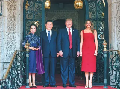  ?? RAO AIMIN / XINHUA ?? President Xi Jinping and his wife, Peng Liyuan, join US President Donald Trump and his wife, Melania, at the Mar-a-Lago resort in Palm Beach, Florida, on Thursday.