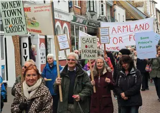  ??  ?? Community-minded: Local protesters march against developers in Kent
