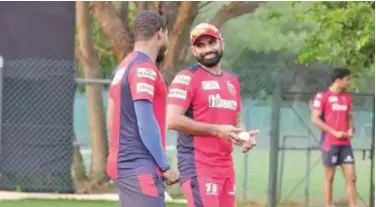  ?? Courtesy: MI website ?? ↑
Mumbai Indians’ players attend a training session ahead of their IPL match agaisnst Punjab Kings.