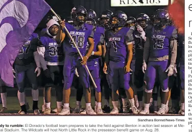  ?? Siandhara Bonnet/News-Times ?? Ready to rumble: El Dorado's football team prepares to take the field against Benton in action last season at Memorial Stadiuim. The Wildcats will host North Little Rock in the preseason benefit game on Aug. 28.