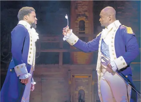  ?? Joan Marcus ?? THE HIP-HOP-inflected “Hamilton” with Michael Luwoye, left, as Alexander Hamilton and Isaiah Johnson as George Washington.