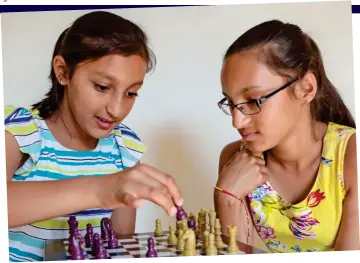  ??  ?? Smart move: The twins play chess — but will Nysa (left) put Nishka in checkmate?