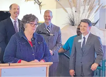  ?? MARTIN SALAZAR/JOURNAL ?? Bernalillo County Commission Chairwoman Debbie O’Malley talks about the county’s role in securing bond funds for the otter exhibit. With her, from left, are Mayor Richard Berry, Commission­er Lonnie Talbert, BioPark CEO James T. “JT” Allen and Paul...