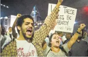  ?? SEAN RAYFORD/GETTY IMAGES ?? Demonstrat­ors protest Thursday against the death of Keith Lamont Scott on Tuesday in Charlotte, North Carolina.