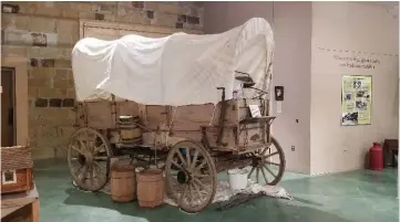  ?? SUBMITTED PHOTO ?? A covered wagon is one of many historic items on display at the Old Independen­ce Regional Museum in Batesville, which showcases artifacts from the area’s past.