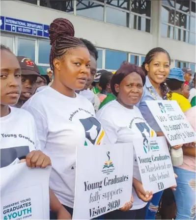  ?? ?? Zimbabwe Young Graduates and Youth Developmen­t Forum welcome President Emmerson Mnangagwa at JM Nkomo Airport in Bulawayo on Thursday ahead of a NUST graduation ceremony yesterday