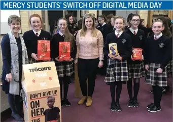  ??  ?? Mercy College students present money to Trócaire from their recent Switch off Digital Media Day.