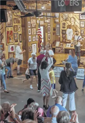  ??  ?? Dancing to the Hogslop String Band at the Carter Family Fold in Hiltons, Va. Though musicologi­sts may take issue with the assigning of country music’s origin to any one time or place, the famous Bristol Sessions of 1927 were influentia­l in the birth of country music.