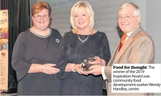  ??  ?? The
Food for thought winner of the 2019 Inspiratio­n Award was community food developmen­t worker Wendy Handley, centre
Exemplary