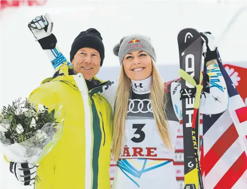  ?? Christophe Pallot/Agence Zoom, Getty Images ?? Lindsey Vonn, the winningest female ski racer of all time, celebrates her final race with Ingemar Stenmark, the winningest male ski racer of all time, Sunday at the world championsh­ips in Are, Sweden. Vonn reached the podium, finishing third in the downhill.