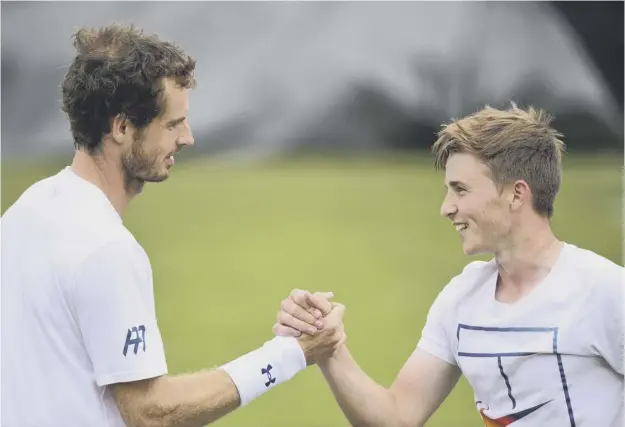  ??  ?? 0 Sir Andy Murray has been helping his fellow Scot, Aidan Mchugh, with his tennis game. The teenager is the British junior number two