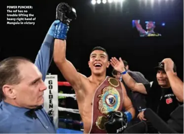  ?? Photo: MATT HEASLEY/HOGANPHOTO­S/GOLDEN BOY PROMOTIONS ?? POWER PUNCHER: The ref has no trouble lifting the heavy right hand of Munguia in victory