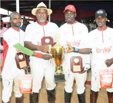  ??  ?? Players of Red Crown team showcasing their prizes after defeating Yola Yelwa to win the Present Cup at a recently concluded Jos winter polo tournament