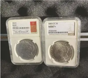  ?? PHOTO COURTESY DOUG DAVIS ?? Fake coins in fake holders. The coin on the left is smooth and is a crude, easily identifiab­le counterfei­t devoid of detail. The labels or inserts displayed are characteri­stically counterfei­t because of the color of the label.