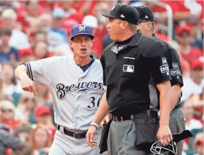  ?? ASSOCIATED PRESS ?? Brewers manager Craig Counsell is ejected by home plate umpire Cory Blaser in the first inning.