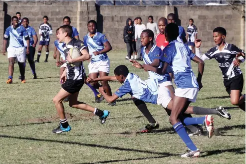  ??  ?? Ntaba Maria U15, in blue, beat Mary Waters 15-10 to make it through to the U15 final.