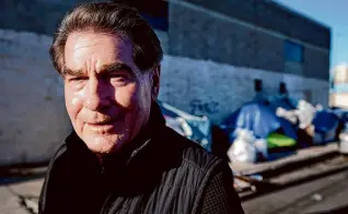  ?? Richard Vogel/Associated Press ?? Senate candidate Steve Garvey tours Skid Row in L.A. on Jan. 11. The former Dodger is the only recognizab­le Republican on the March ballot.