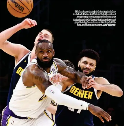  ?? AFP PHOTO ?? LeBron James (center) of the Los Angeles Lakers steals the ball in front of Nikola Jokic (left) and Jamal Murray of the Denver Nuggets in the second half during Game 4 of the Western Conference first round playoffs at Crypto.com Arena on Saturday, April 27, 2024, in Los Angeles, California.
