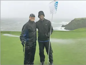  ?? AP PHOTO ?? PGA Tour veteran Jerry Kelly, left, and Green Bay quarterbac­k Aaron Rodgers pose on the 8th green at Pebble Beach, Calif., on Tuesday, while playing in 40 mph wind and rain. Only at Pebble Beach are players willing to go out in such miserable conditions.