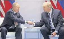  ?? REUTERS FILE ?? Vladmir Putin and Donald Trump in Hamburg in July.