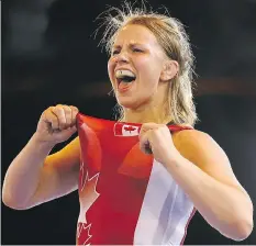  ?? KIRSTY WIGGLESWOR­TH/THE ASSOCIATED PRESS ?? Erica Wiebe of Canada, seen celebratin­g gold in wrestling during the 2014 Commonweal­th Games, is still looking to secure a spot for the Rio Olympics.