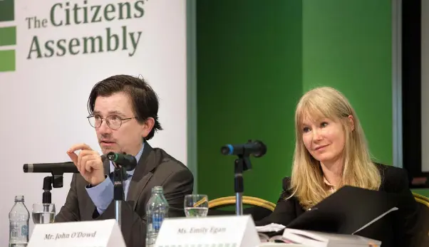  ??  ?? BACKGROUND: UCD law lecturer John O’Dowd and Emily Egan SC speak at the Citizens’ Assembly in the Grand Hotel, Malahide, Co Dublin. Photo: Tony Gavin