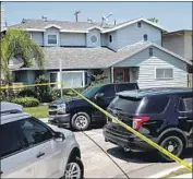  ?? Kent Nishimura Los Angeles Times ?? A LONG BEACH home was among the sites searched. Officials also interviewe­d those injured.
