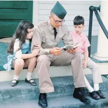  ?? COURTESY OF THE CROCKER FAMILY/PBS ?? A U.S. soldier with his siblings before leaving for Vietnam in 1965. For the documentar­y, thousands of hours of film were reduced to 18 hours.