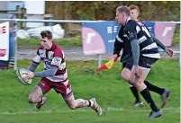  ?? Tim Taylor ?? ●●Pat Gillan crosses for a try