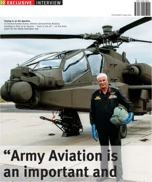  ?? PHOTOGRAPH: Indian Army ?? Closing in on the Apaches: Lt General Kanwal Kumar, Director General Army Aviation, standing in front of an Apache – “tank in the air” – as the Army preps for the attack helicopter role