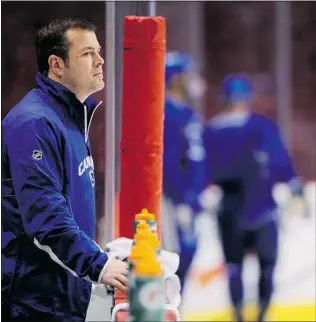  ?? ARLEN REDEKOP/ PNG FILES ?? Vancouver Canucks coach Alain Vigneault’s contract has been extended to 2015. If he stays aboard for the duration of the deal, his nine years as Canucks coach would be unpreceden­ted.