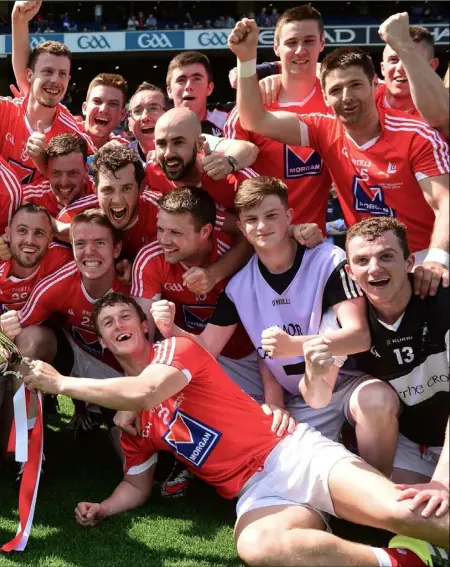  ??  ?? Louth celebrate their Lory Meagher Cup triumph, while left, Darren O’Hanrahan and Gerard Smyth embrace.