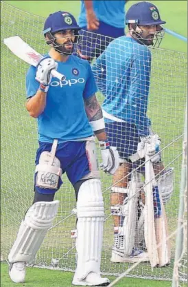  ?? PTI ?? India captain Virat Kohli and Rohit Sharma during nets at the Eden Gardens on Tuesday. The first Test begins in Kolkata on Thursday.
