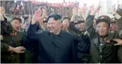  ?? — AFP ?? North Korean leader Kim Jong-Un celebrates the successful test-fire of the interconti­nental ballistic missile Hwasong-14 at an undisclose­d location.
Kim Jong Un said the test completed his country’s weapons capability that includes atomic, hydrogen...