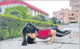  ?? TWITTER ?? Lifter Mirabai Chanu trains at NIS, Patiala, on Sunday.