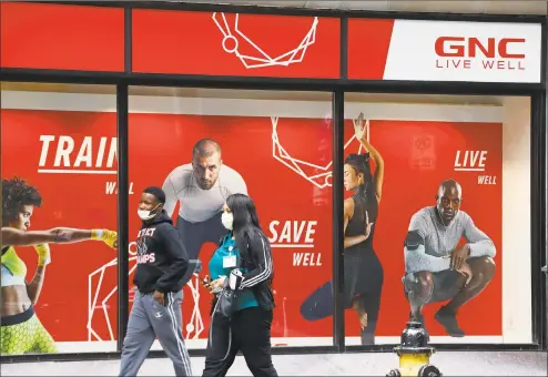  ?? Associated Press ?? GNC included 13 locations in its initial closures after filing in June for bankruptcy protection from creditors, among more than 700 nationally.